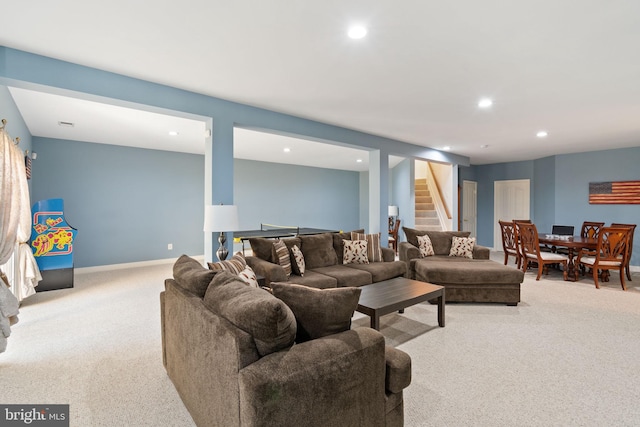 living room featuring stairway, carpet, and recessed lighting