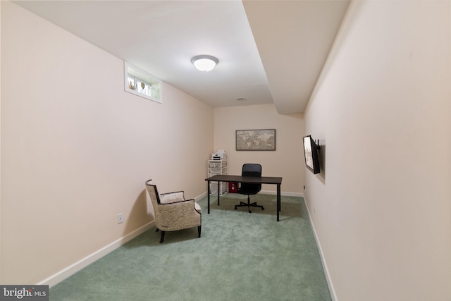 carpeted office space with baseboards