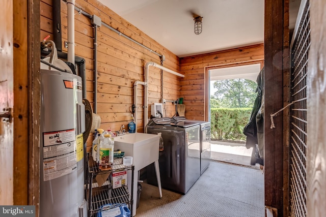 537 Cannon Ball Rd, Berryville, VA 22611 - washroom featuring independent washer and dryer, electric water heater, carpet, and wooden walls