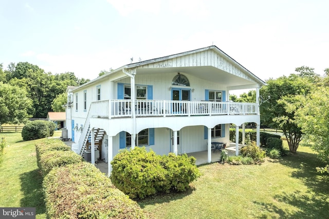 537 Cannon Ball Rd, Berryville, VA 22611 - back of property featuring a yard, a patio area, central air condition unit, and stairway