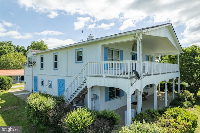 537 Cannon Ball Rd, Berryville, VA 22611 - rear view of house with stairway and a patio area