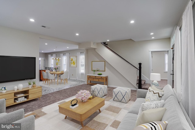 25 E High St, Felton, DE 19943 - living room featuring carpet flooring, stairway, and recessed lighting
