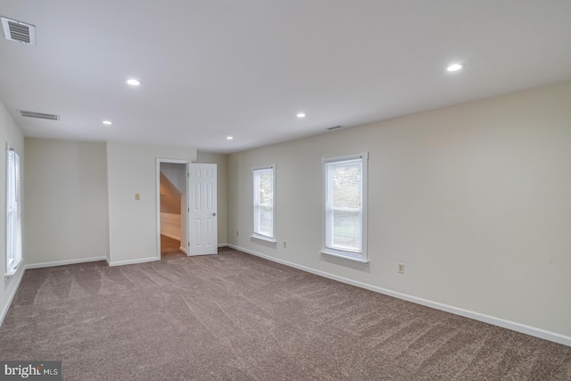 25 E High St, Felton, DE 19943 - empty room featuring carpet flooring, healthy amount of natural light, and recessed lighting