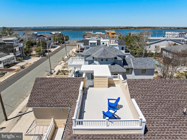 drone / aerial view featuring a water view