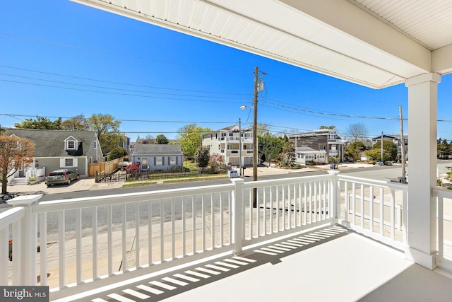 view of patio with a porch and a residential view