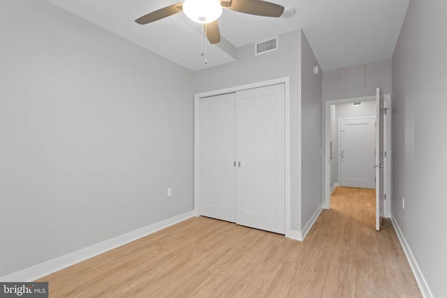 1320 Fenwick Ln Unit 402, Silver Spring, MD 20910 - unfurnished bedroom featuring visible vents, a closet, light wood-style floors, baseboards, and ceiling fan