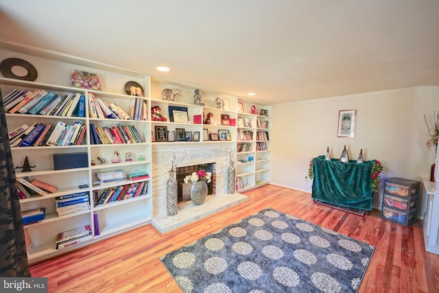 living area featuring recessed lighting and wood finished floors