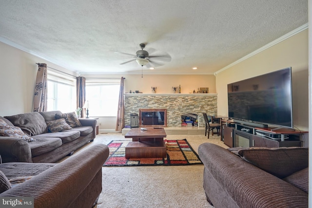 carpeted living room with ceiling fan, ornamental molding, and a textured ceiling