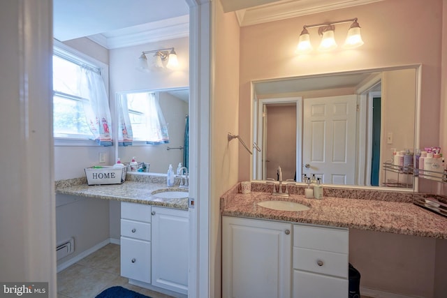 bathroom featuring vanity, ornamental molding, and tile patterned flooring