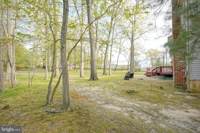 view of yard featuring a deck
