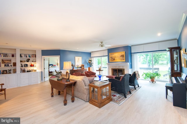 2210 Horns Point Rd, Cambridge, MD 21613 - living area featuring ceiling fan, wood finished floors, plenty of natural light, and ornamental molding