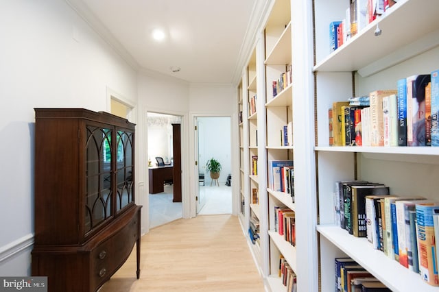 2210 Horns Point Rd, Cambridge, MD 21613 - hall with wood finished floors, crown molding, and built in shelves