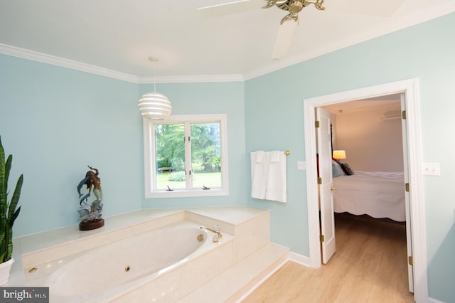 2210 Horns Point Rd, Cambridge, MD 21613 - bathroom featuring a whirlpool tub, wood finished floors, connected bathroom, crown molding, and baseboards