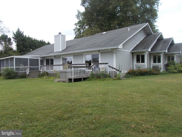 2210 Horns Point Rd, Cambridge, MD 21613 - back of property with a sunroom, a lawn, a chimney, and a deck