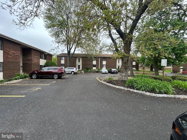 view of road featuring curbs