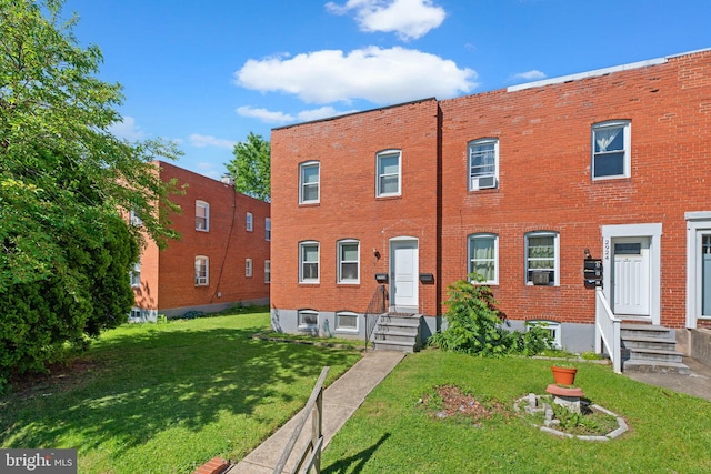 2926 Yorkway, Baltimore, MD 21222 - view of front of property featuring entry steps, brick siding, and a front lawn