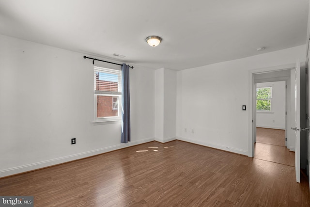 2926 Yorkway, Baltimore, MD 21222 - unfurnished room with wood finished floors and baseboards
