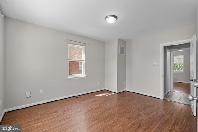 2926 Yorkway, Baltimore, MD 21222 - unfurnished bedroom featuring wood finished floors and baseboards