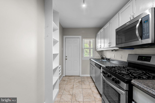 2926 Yorkway, Baltimore, MD 21222 - kitchen featuring stainless steel appliances, a sink, open shelves, white cabinets, and dark countertops