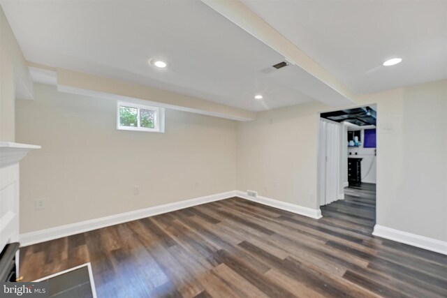6824 Duluth Ave, Dundalk, MD 21222 - basement with dark wood finished floors, baseboards, and recessed lighting