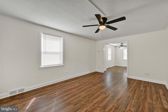 6824 Duluth Ave, Dundalk, MD 21222 - empty room with a ceiling fan, wood finished floors, and baseboards