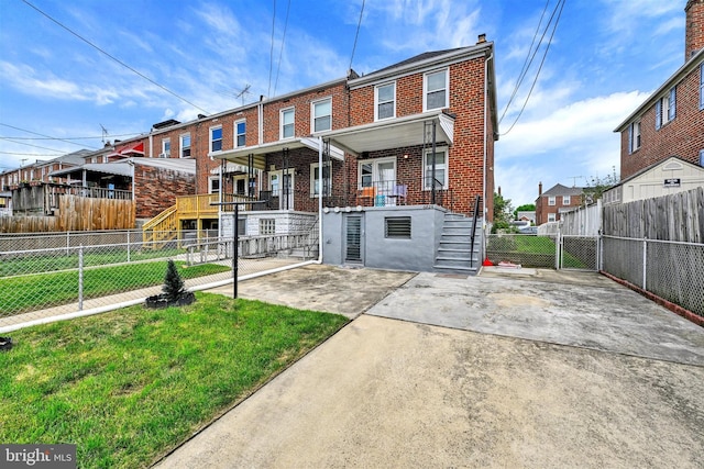 6824 Duluth Ave, Dundalk, MD 21222 - view of front of home with stairs, brick siding, and a residential view