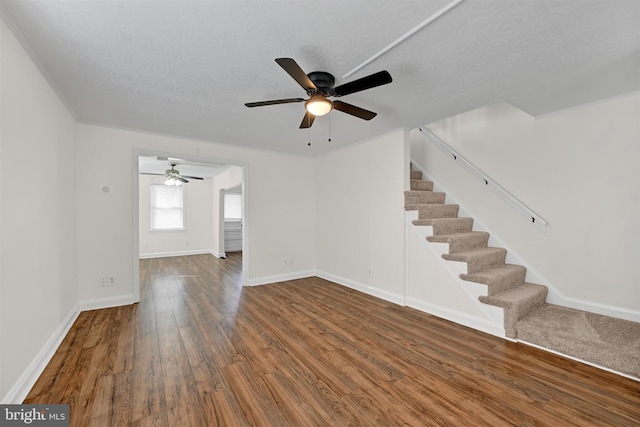 6824 Duluth Ave, Dundalk, MD 21222 - unfurnished living room with stairway, a ceiling fan, wood finished floors, and baseboards