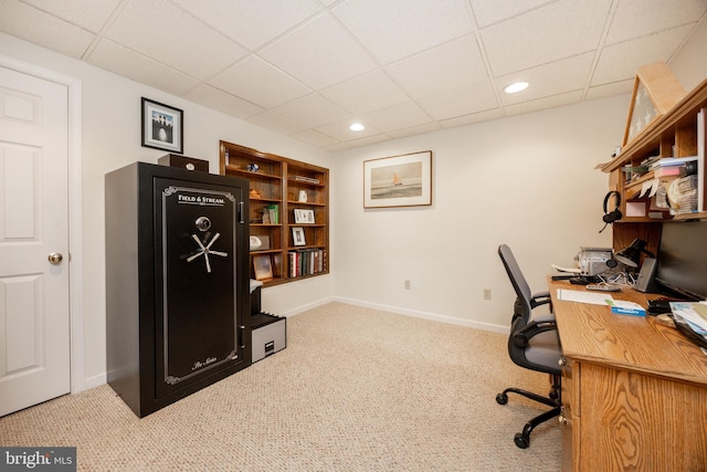carpeted office space with recessed lighting, baseboards, and a paneled ceiling