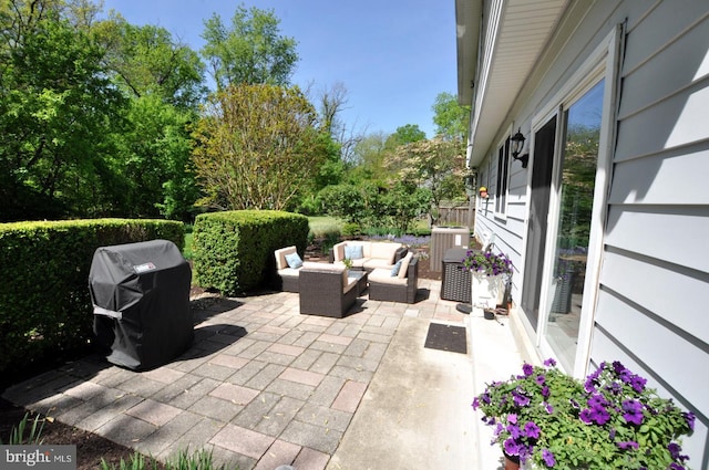 view of patio / terrace with an outdoor hangout area and area for grilling
