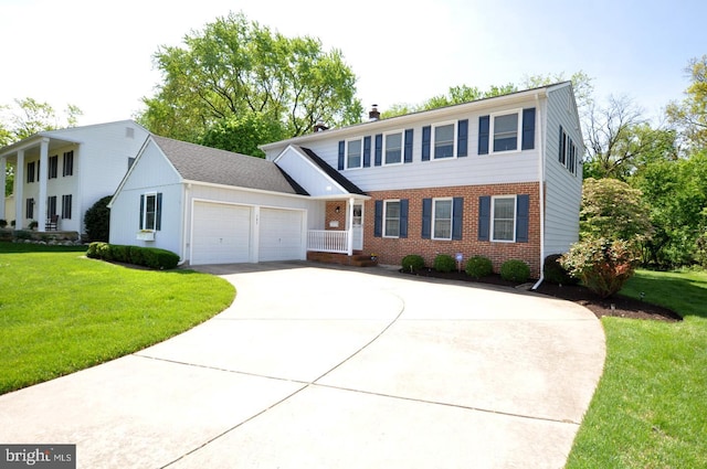 colonial-style house with concrete driveway, brick siding, an attached garage, and a front lawn