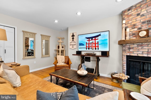 1 Christian St Unit 44L, Philadelphia, PA 19147 - living area featuring recessed lighting, baseboards, wood finished floors, and a fireplace