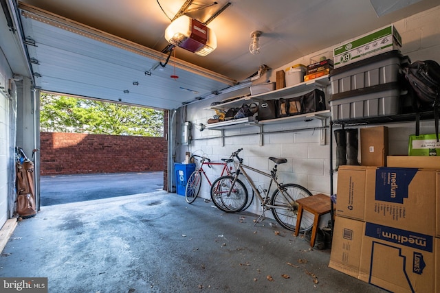 1 Christian St Unit 44L, Philadelphia, PA 19147 - garage with concrete block wall and a garage door opener