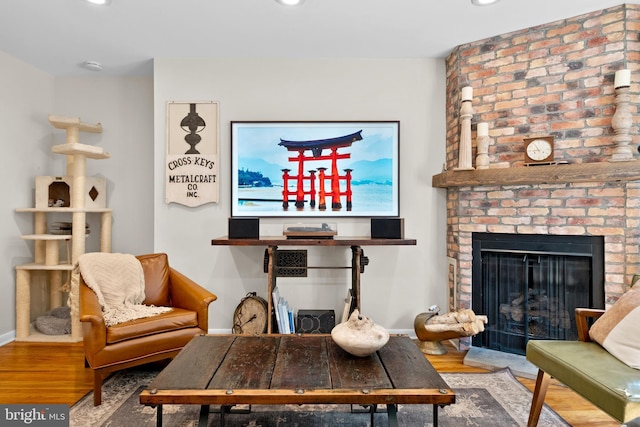 1 Christian St Unit 44L, Philadelphia, PA 19147 - living area featuring baseboards, recessed lighting, a brick fireplace, and wood finished floors