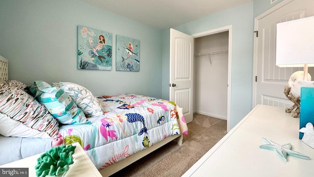 carpeted bedroom featuring a closet