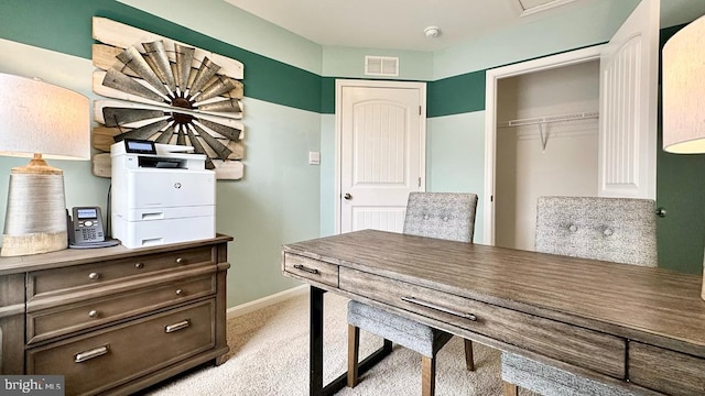 home office with visible vents, baseboards, and carpet floors