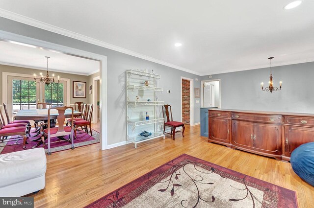 314 N Post Rd, Princeton Junction, NJ 08550 - living room with a chandelier, light wood-type flooring, baseboards, crown molding, and recessed lighting