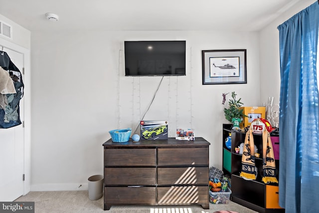 bedroom with baseboards and carpet flooring