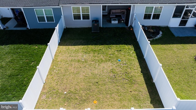 view of yard with a fenced backyard and a patio area