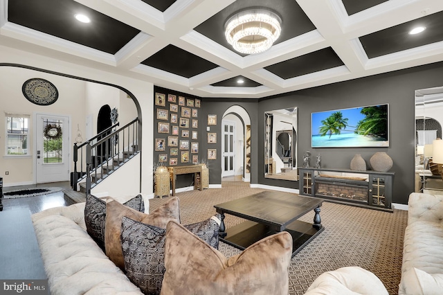 6206 Payton Way, Frederick, MD 21703 - living area featuring stairway, carpet floors, arched walkways, coffered ceiling, and baseboards