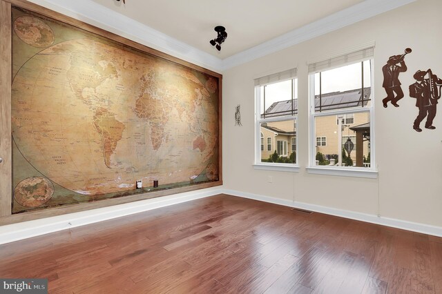 6206 Payton Way, Frederick, MD 21703 - spare room featuring wood finished floors, baseboards, and ornamental molding