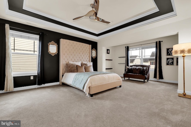 6206 Payton Way, Frederick, MD 21703 - carpeted bedroom with a ceiling fan, baseboards, a raised ceiling, and ornamental molding