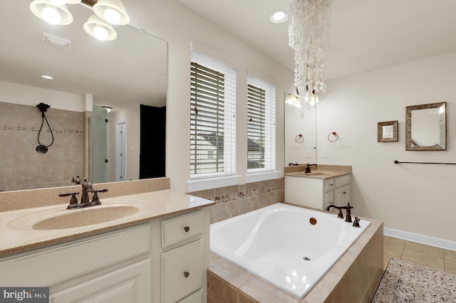 6206 Payton Way, Frederick, MD 21703 - bathroom with a bath, a tile shower, two vanities, tile patterned flooring, and recessed lighting