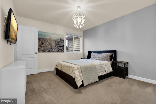 6206 Payton Way, Frederick, MD 21703 - bedroom featuring baseboards, an inviting chandelier, and carpet floors