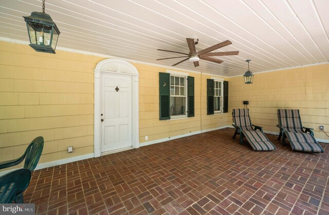 view of patio featuring a ceiling fan