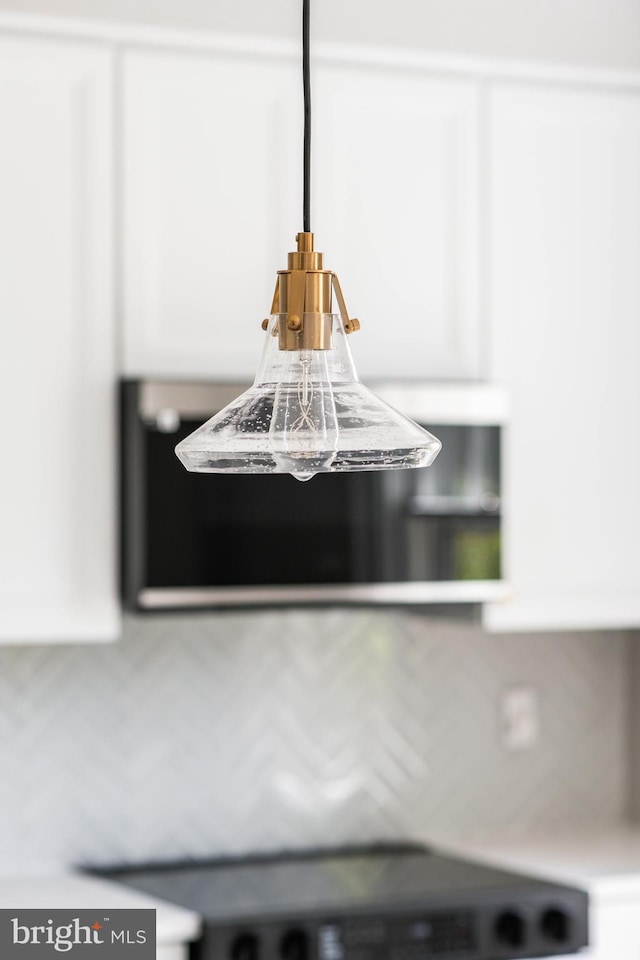interior details featuring white cabinets