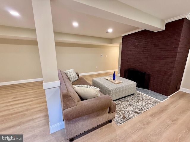 9905 Stoughton Rd, Fairfax, VA 22032 - living area featuring a fireplace, recessed lighting, baseboards, and wood finished floors