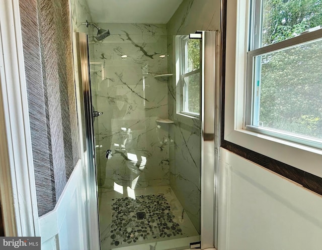 9905 Stoughton Rd, Fairfax, VA 22032 - full bath with toilet, a marble finish shower, and plenty of natural light