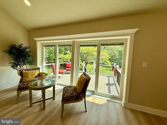 9905 Stoughton Rd, Fairfax, VA 22032 - entryway featuring baseboards, a healthy amount of sunlight, and wood finished floors