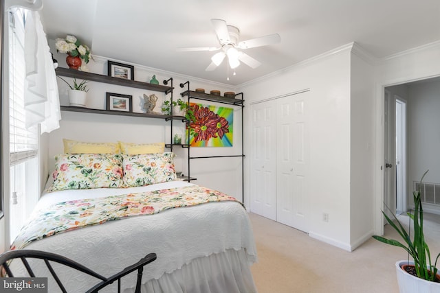 3635 Wessex Ln, Huntingtown, MD 20639 - carpeted bedroom with a closet, crown molding, baseboards, and a ceiling fan