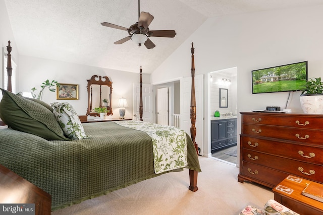 3635 Wessex Ln, Huntingtown, MD 20639 - bedroom with light colored carpet, high vaulted ceiling, ceiling fan, and ensuite bathroom